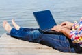 Young man with laptop working outdoor Royalty Free Stock Photo