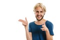 Young man laughing pointing with fingers Royalty Free Stock Photo