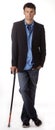 Young man leaning on cane Royalty Free Stock Photo