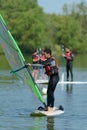Young man learning windsurfing Royalty Free Stock Photo