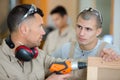 young man learning wood classes Royalty Free Stock Photo
