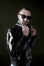 Young man in leather jacket and sunglasses Royalty Free Stock Photo