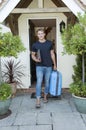 Young man leaving home Royalty Free Stock Photo