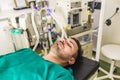 Young man lies on the operating table Royalty Free Stock Photo
