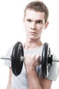 Young man lift weight in gym