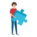 young man lifting puzzle game piece Royalty Free Stock Photo