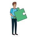 young man lifting puzzle game piece Royalty Free Stock Photo