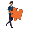 young man lifting puzzle game piece Royalty Free Stock Photo