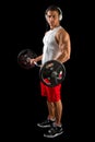 Young man lifting weights.