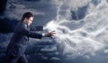 Young man with lightnings from his hands Royalty Free Stock Photo