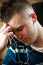 Young Man Listening to Music