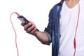 Young man listening to music with smartphone. Royalty Free Stock Photo