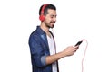 Young man listening to music with smartphone. Royalty Free Stock Photo