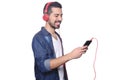 Young man listening to music with smartphone. Royalty Free Stock Photo