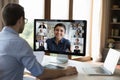 Young man look at computer screen study in conference app Royalty Free Stock Photo