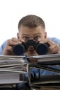 Young man looking through binocular Royalty Free Stock Photo