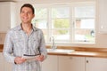 Young Man Looking At Details For New Home Royalty Free Stock Photo