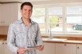 Young Man Looking At Details For New House Royalty Free Stock Photo