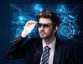 Young man looking with futuristic smart high tech glasses Royalty Free Stock Photo