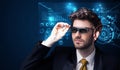 Young man looking with futuristic smart high tech glasses Royalty Free Stock Photo