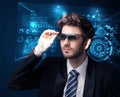 Young man looking with futuristic smart high tech glasses Royalty Free Stock Photo