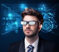 Young man looking with futuristic smart high tech glasses Royalty Free Stock Photo