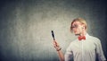 Young man looking with magnifying glass Royalty Free Stock Photo