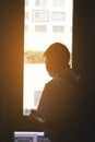 Young man looking out of window Royalty Free Stock Photo