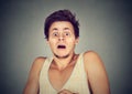 Young man looking shocked scared Royalty Free Stock Photo