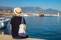 Young man looks at the Alanya port