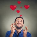 Young man in love making a wish Royalty Free Stock Photo