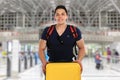 Young man with luggage baggage airport bag flying travel traveling vacation holidays Royalty Free Stock Photo