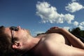 Young man lying on a beach Royalty Free Stock Photo