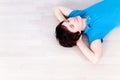 Young man lying on floor Royalty Free Stock Photo