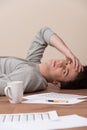 Young man lying on floor and looking into camera. Royalty Free Stock Photo