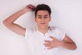 Young man, lying on the floor, thinking Royalty Free Stock Photo