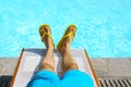 Young man lying on sunbed near pool. Summer vacation and travel Royalty Free Stock Photo