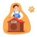 Young man makes dog kennel, a booth, holding hammer, nails. Royalty Free Stock Photo