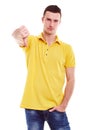 Young man makes a gesture thumb down Royalty Free Stock Photo