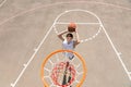 Young Man Making Jump Shot on Basketball Court Royalty Free Stock Photo