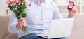 Young man making marriage proposal over internet laptop Royalty Free Stock Photo