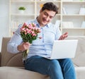 Young man making marriage proposal over internet laptop Royalty Free Stock Photo