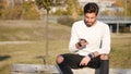 Young man making phone call outdoor in city Royalty Free Stock Photo