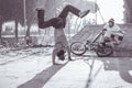 Young man making video of rasta breakdancing perfoming in city park - Hip hop style people having fun - Friendship concept - Focus Royalty Free Stock Photo