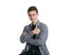 A young man in a Manatee shirt, black t-shirt and trousers, isolated on white Royalty Free Stock Photo