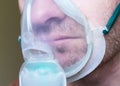 Young Man with mask oxygen inhalation