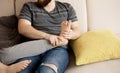 Young man massaging his lover`s feet. Royalty Free Stock Photo