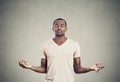 Young man meditating Royalty Free Stock Photo