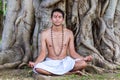 Young man meditating Royalty Free Stock Photo