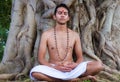 Young man meditating Royalty Free Stock Photo